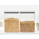 Átlátszó műanyag tartály.