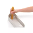 Spagetti-adagoló segédlet az edény alján.